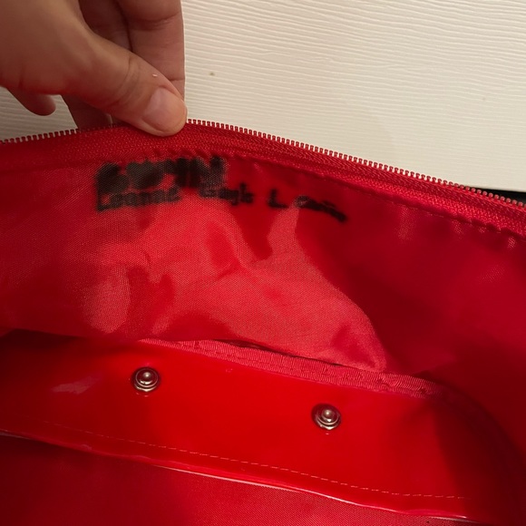 Hello Kitty 12” tall suitcase with wheels. - Picture 9 of 12